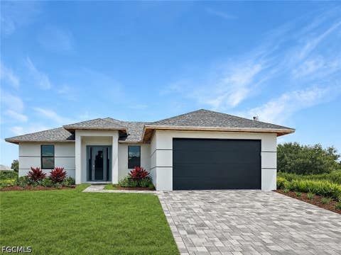 Photo of 628 NW 15th Terrace, Cape Coral, FL 33993 (MLS # 2026035175)