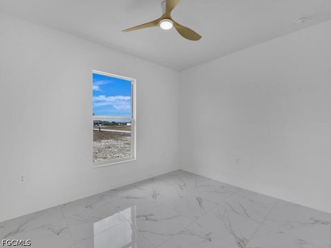Tiny photo for 106 NW 20th Street, Cape Coral, FL 33993 (MLS # 2026020132)