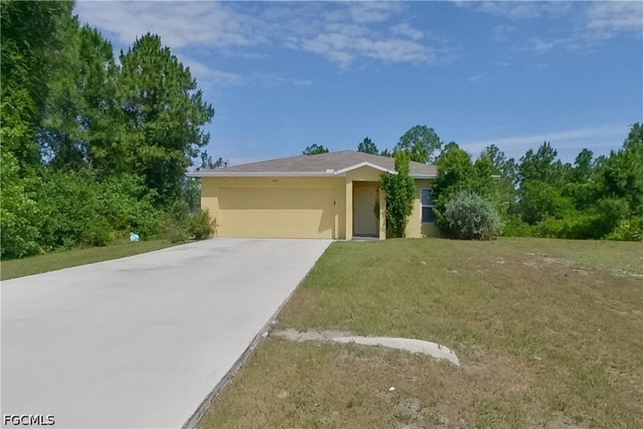 Photo 1 of 28 — 947 Grant Boulevard, Lehigh Acres, FL 33974