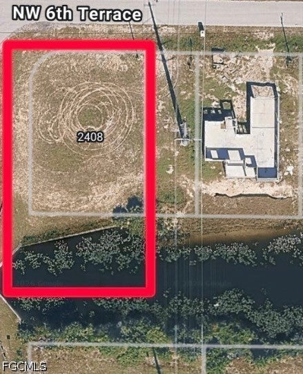 Photo of 2408 NW 6th Terrace, Cape Coral, FL 33993 (MLS # 2026038464)