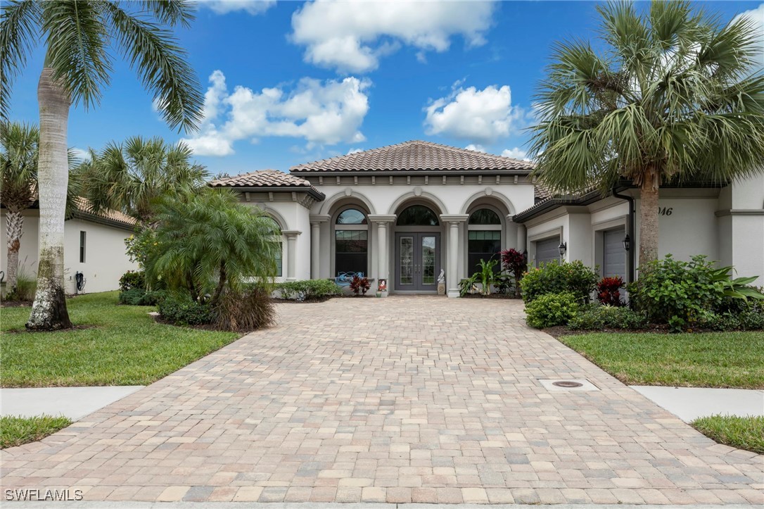 Mediterranean / spanish-style home featuring stucc