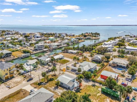 Tiny photo for 2371 Baybreeze Street, St James City, FL 33956 (MLS # 2026013461)