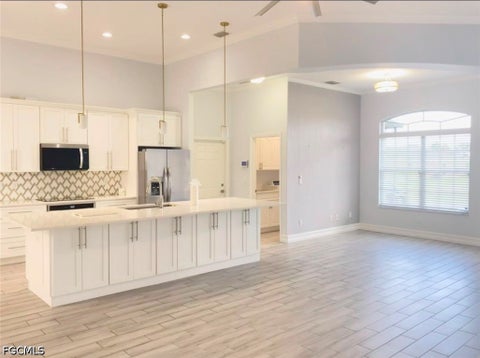 Photo of 1418 NE 11th Terrace, Cape Coral, FL 33909 (MLS # 2026039743)
