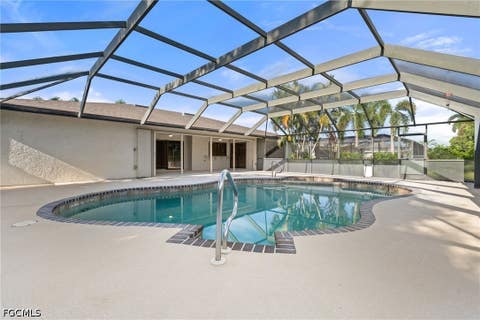 Tiny photo for 701 SE 35th Terrace, Cape Coral, FL 33904 (MLS # 2026033774)