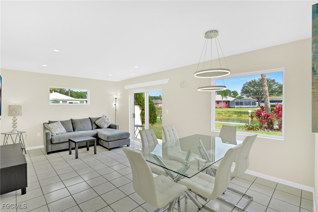 Dining room featuring light tile patterned floors