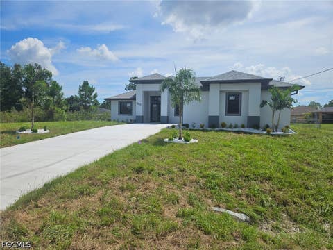 Photo of 1102 Poinsettia Avenue, Lehigh Acres, FL 33972 (MLS # 2026035464)
