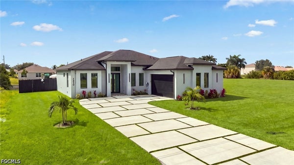 1310 NE 6TH AVE, CAPE CORAL, FL 33909 - Image f6628d0fddf904ceee0f2bc21811ea32/1333876275