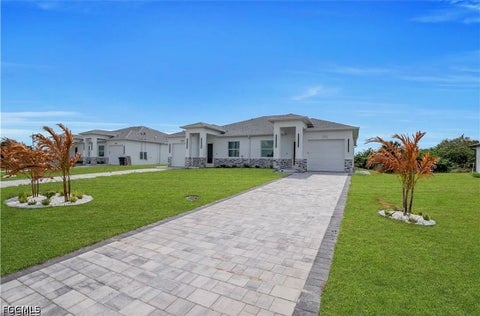 Photo of 320 Poplar Street, Lehigh Acres, FL 33974 (MLS # 2026039536)