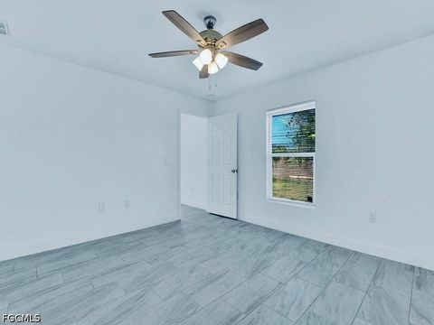 Tiny photo for 851 Bedford Drive, Lehigh Acres, FL 33974 (MLS # 2026023086)