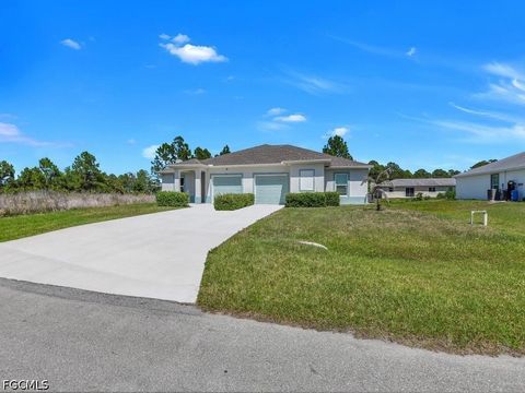 Tiny photo for 851 Bedford Drive, Lehigh Acres, FL 33974 (MLS # 2026023086)