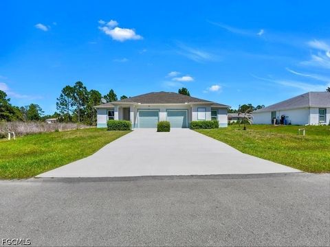 Photo of 851 Bedford Drive, Lehigh Acres, FL 33974 (MLS # 2026023086)