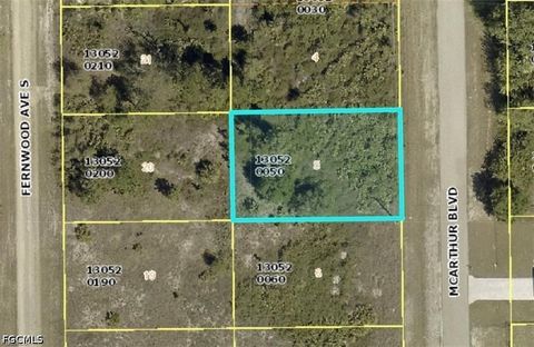 Photo of 414 McArthur Boulevard, Lehigh Acres, FL 33974 (MLS # 2026019992)