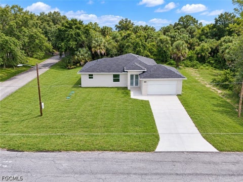 Photo of 1801 E 8th Street, Lehigh Acres, FL 33972 (MLS # 2026037919)