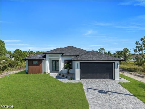 Photo of 3307 13th Street SW, Lehigh Acres, FL 33976 (MLS # 2026041895)