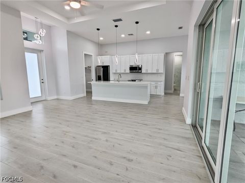 Tiny photo for 3027 SW 16th Place, Cape Coral, FL 33914 (MLS # 2026014700)