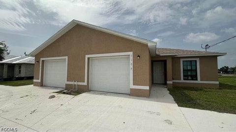 Photo of 1109 Gleason Parkway, Cape Coral, FL 33914 (MLS # 2026039600)