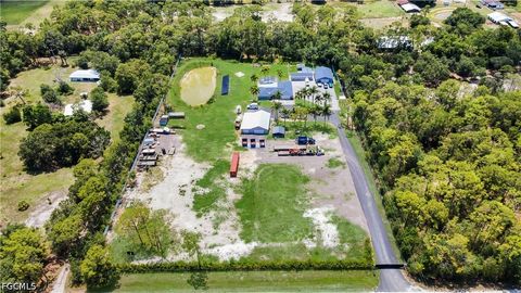 Photo of 19901 Pine Echo Road, North Fort Myers, FL 33917 (MLS # 2026026925)