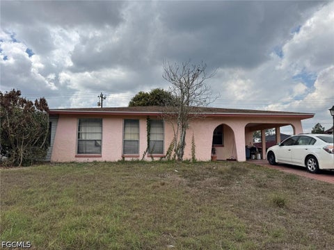 Photo of 320 Inwood Avenue S, Lehigh Acres, FL 33936 (MLS # 2026040595)