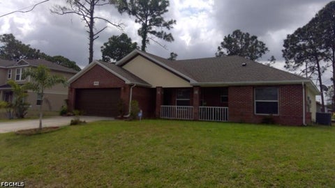 Photo of 3905 16th Street W, Lehigh Acres, FL 33971 (MLS # 2026030810)