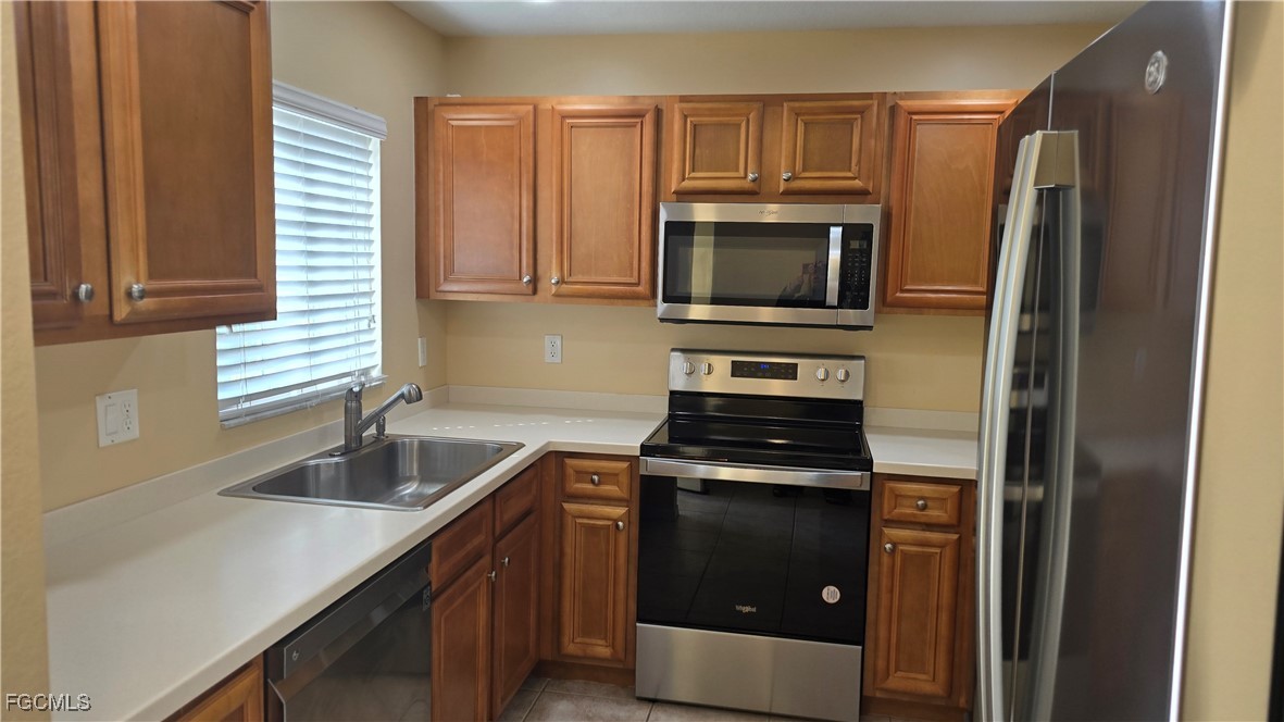 Kitchen featuring appliances with stainless steel