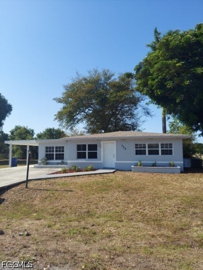 Photo of 722 W Cleveland Lane, Lehigh Acres, FL 33936 (MLS # 2026039954)