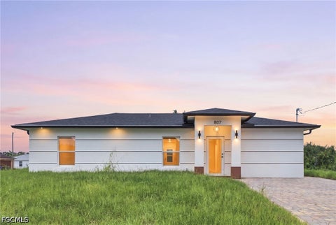 Photo of 807 Casper Yost Street E, Lehigh Acres, FL 33974 (MLS # 2026038534)