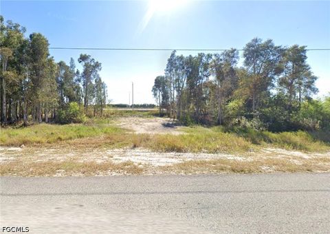 Photo of 3128 Meadow Road, Lehigh Acres, FL 33974 (MLS # 2026019729)
