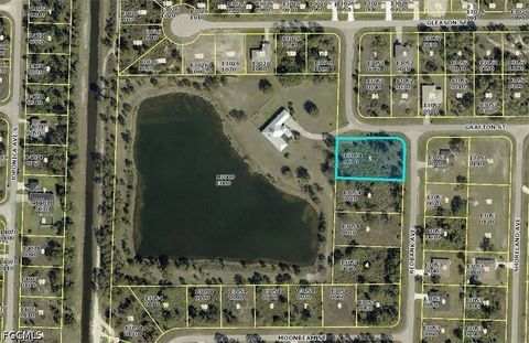Photo of 1048 Redbank Avenue, Lehigh Acres, FL 33974 (MLS # 2026020470)