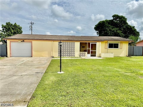 Photo of 1219 Dunndale Street, Lehigh Acres, FL 33936 (MLS # 2026038620)