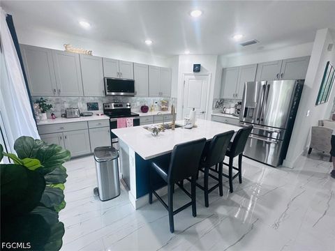 Tiny photo for 317 SW 26th Avenue, Cape Coral, FL 33991 (MLS # 2026020360)
