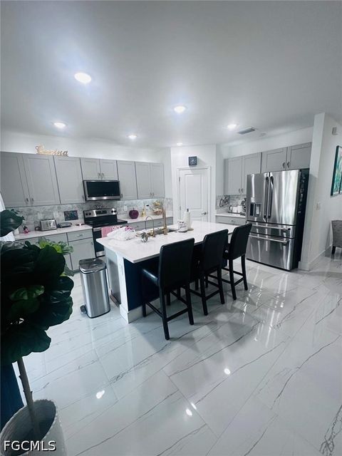 Tiny photo for 317 SW 26th Avenue, Cape Coral, FL 33991 (MLS # 2026020360)