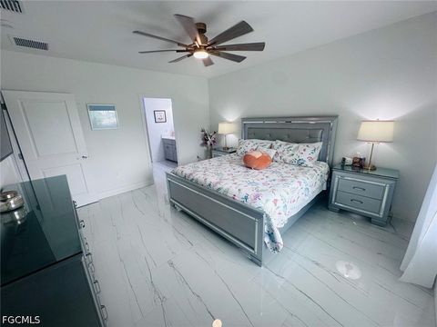Tiny photo for 317 SW 26th Avenue, Cape Coral, FL 33991 (MLS # 2026020360)