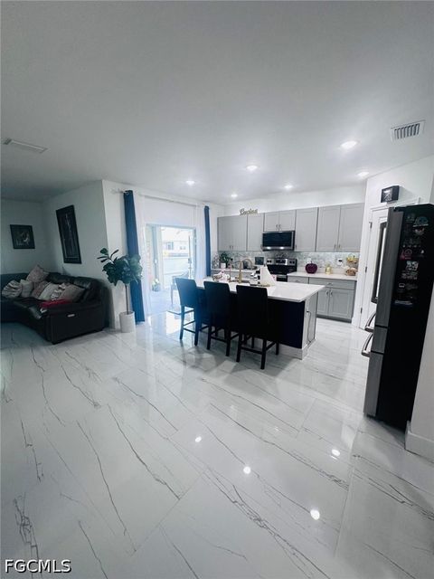 Tiny photo for 317 SW 26th Avenue, Cape Coral, FL 33991 (MLS # 2026020360)