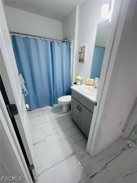 Tiny photo for 317 SW 26th Avenue, Cape Coral, FL 33991 (MLS # 2026020360)