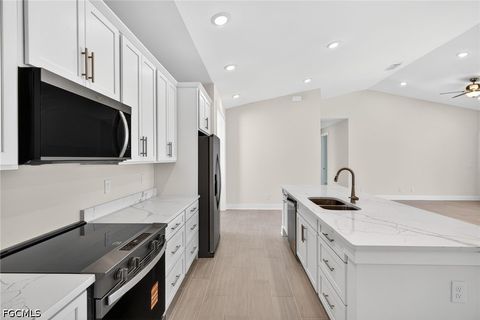 Tiny photo for 136 SW 12th Street, Cape Coral, FL 33991 (MLS # 2026019941)