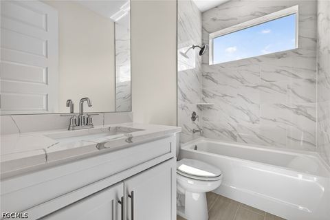 Tiny photo for 136 SW 12th Street, Cape Coral, FL 33991 (MLS # 2026019941)