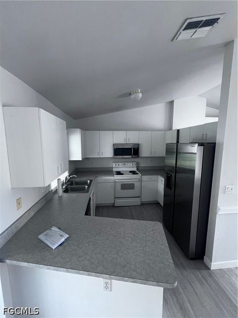 Tiny photo for 1306 SW 11th Street, Cape Coral, FL 33991 (MLS # 2026020156)