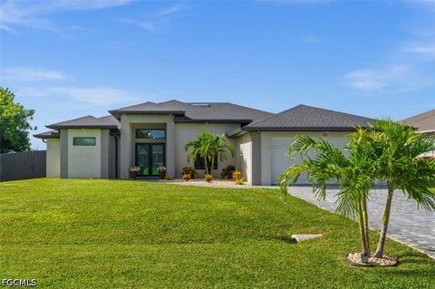 Photo of 322 NW 5th Street, Cape Coral, FL 33993 (MLS # 2026038896)