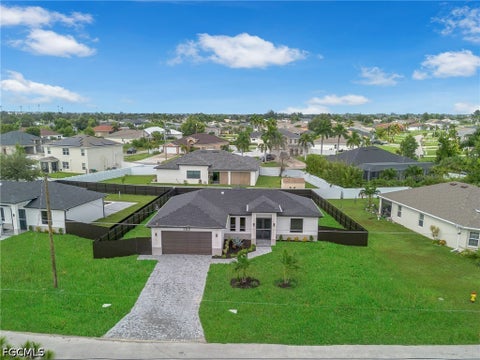 Photo of 352 SW 24th Place, Cape Coral, FL 33991 (MLS # 2026042660)