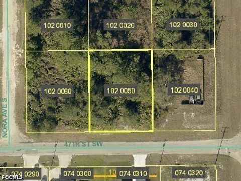 Photo of 3104 47th Street SW, Lehigh Acres, FL 33976 (MLS # 2026018751)