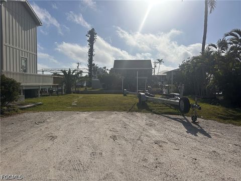 Tiny photo for 16290 Tortuga Street, Bokeelia, FL 33922 (MLS # 2026022656)
