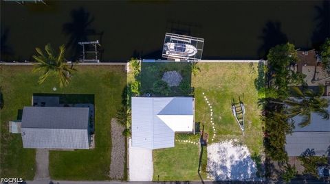 Photo of 16290 Tortuga Street, Bokeelia, FL 33922 (MLS # 2026022656)