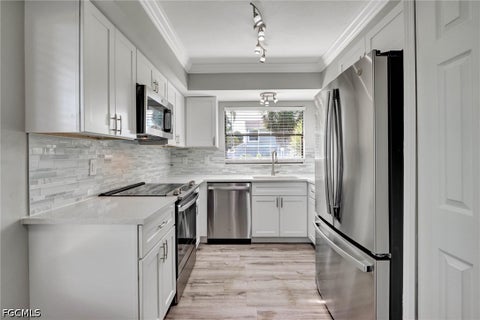 Tiny photo for 1422 SW 50th Street #66, Cape Coral, FL 33914 (MLS # 2026039280)