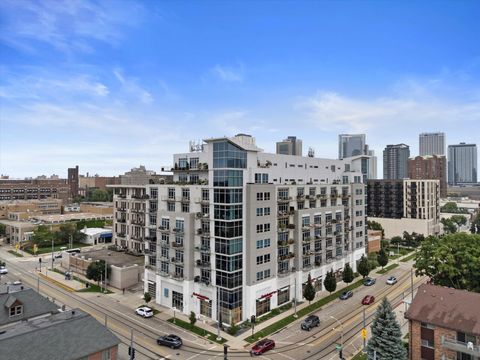 Photo of 601 E Ogden Ave, Milwaukee, WI 53202 (MLS # 1931783)