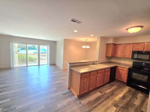 Photo of 520 Windstone Dr, Hartland, WI 53029 (MLS # 1977288)