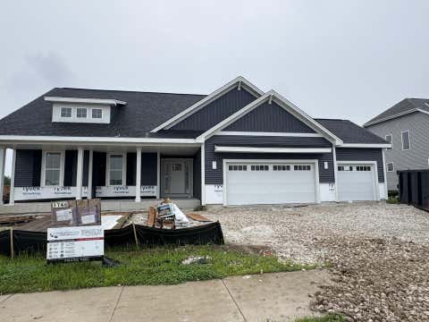 Photo of 1746 Switchgrass St, Oconomowoc, WI 53066 (MLS # 1976211)