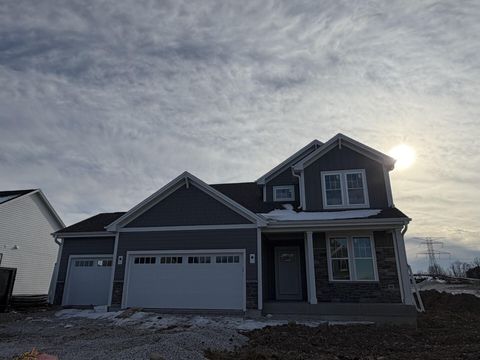 Photo of N50W19473 Tamarind Way, Menomonee Falls, WI 53051 (MLS # 1945260)