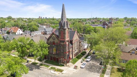 Photo of 140 W Garfield Ave, Milwaukee, WI 53212 (MLS # 1964100)