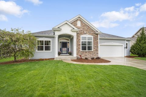 Photo of 1406 Mockingbird Ct, Oconomowoc, WI 53066 (MLS # 1960670)