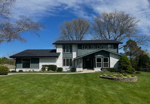 Photo of 7693 Overlook Dr, Greendale, WI 53129 (MLS # 1962179)